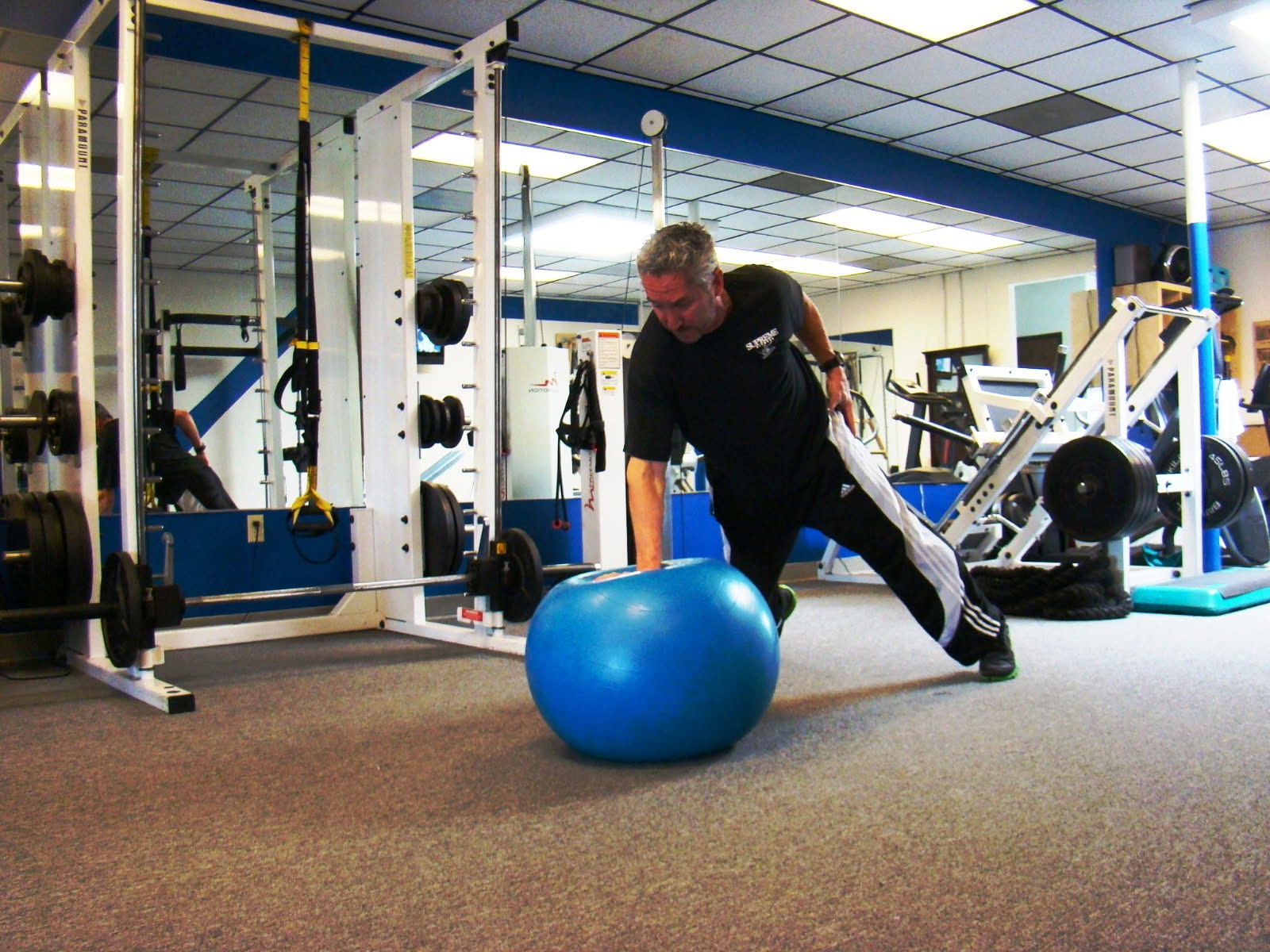 Norman McCallson training on a stability ball at the Supreme Fitness studio in Irvine
